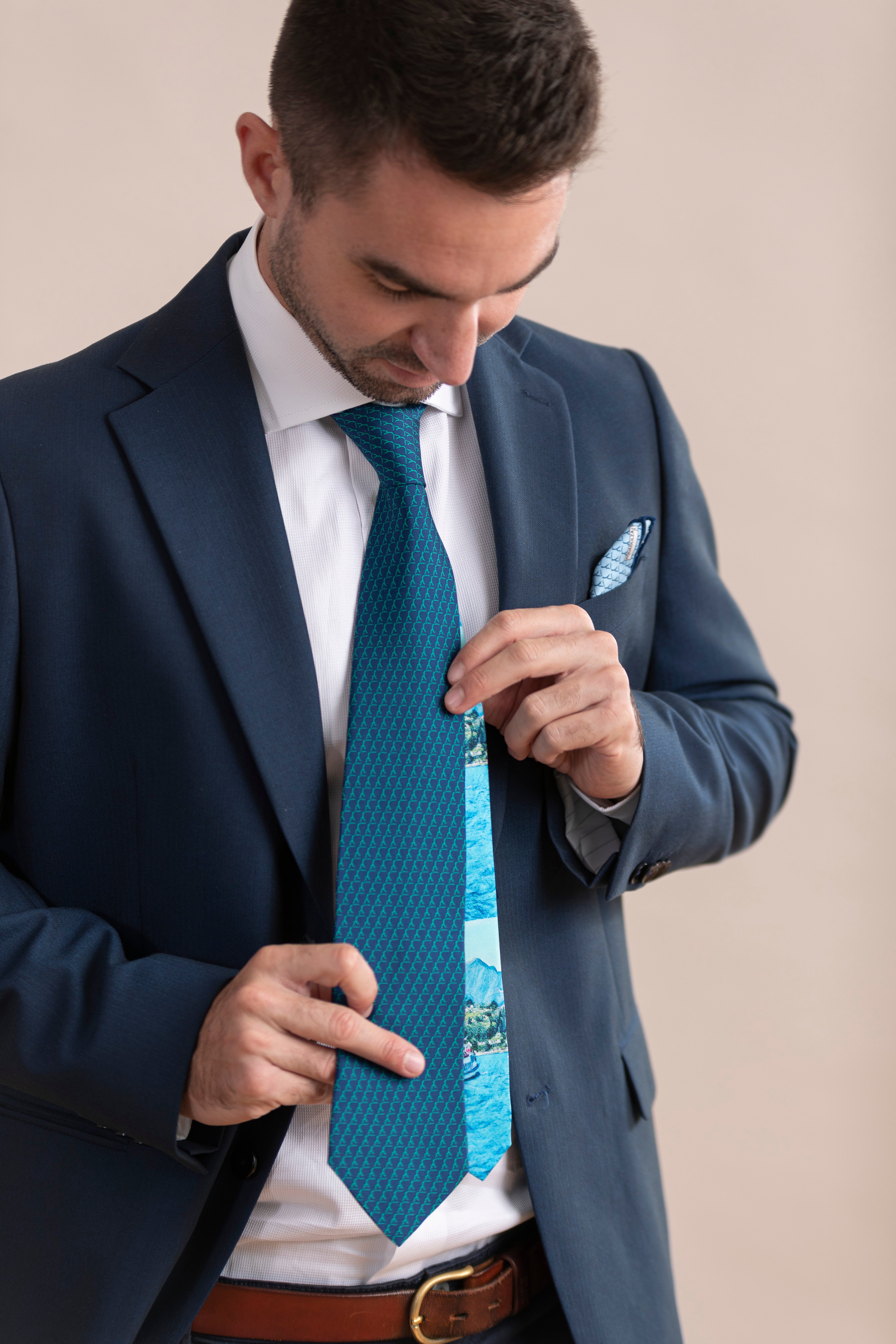 Pure Silk Tie | Blue with Green Logo & Colorful Tail